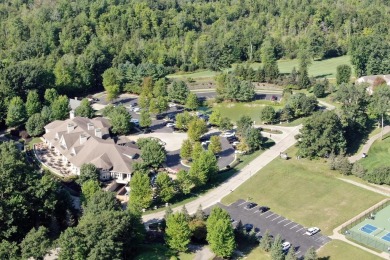 Peaceful and secluded setting on Tullymore Lake! This walkout on Tullymore Golf Club in Michigan - for sale on GolfHomes.com, golf home, golf lot