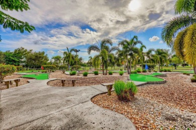 This home in a gated Golf Course community with no mandatory on Cypress Lakes Golf Course - West Palm Beach in Florida - for sale on GolfHomes.com, golf home, golf lot