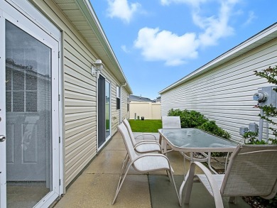 BOND PAID!  ROOF 2023! HVAC 2024!  WELL MAINTAINED COLONY PATIO on The Links of Spruce Creek in Florida - for sale on GolfHomes.com, golf home, golf lot