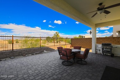 Discover island living at its finest from this serene cul-de-sac on Havasu Island Golf Course in Arizona - for sale on GolfHomes.com, golf home, golf lot