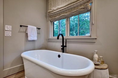 Between two North Carolina mountain ridges lies an expansive on Headwaters Golf Club in North Carolina - for sale on GolfHomes.com, golf home, golf lot