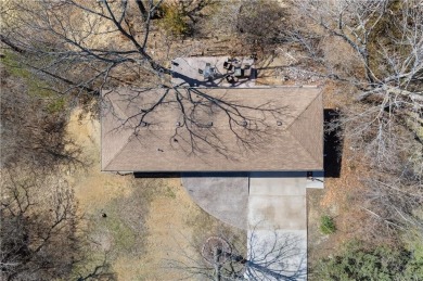 This 4 bed, 2 bath ranch home sits alongside the Excelsior on Excelsior Springs Golf Course in Missouri - for sale on GolfHomes.com, golf home, golf lot
