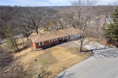 This 4 bed, 2 bath ranch home sits alongside the Excelsior on Excelsior Springs Golf Course in Missouri - for sale on GolfHomes.com, golf home, golf lot