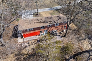 This 4 bed, 2 bath ranch home sits alongside the Excelsior on Excelsior Springs Golf Course in Missouri - for sale on GolfHomes.com, golf home, golf lot