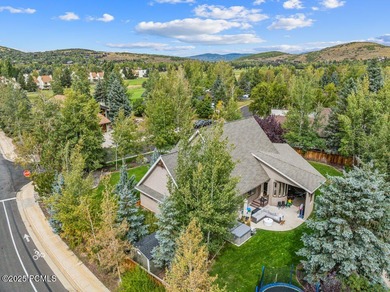 Exceptional single-level custom home nestled in the heart of on Park Meadows Country Club in Utah - for sale on GolfHomes.com, golf home, golf lot