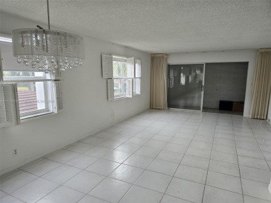 Beautiful clean open 2 Bed 2 BATH condo in 55+ gated community on Inverrary Country Club in Florida - for sale on GolfHomes.com, golf home, golf lot