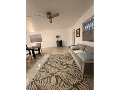 Enjoy tranquil lakeview living in this beautifully updated on Kings Point Golf - Executive in Florida - for sale on GolfHomes.com, golf home, golf lot