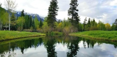 This spectacular .82 acre parcel, one of the original Estate on Teton Pines Golf Club in Wyoming - for sale on GolfHomes.com, golf home, golf lot