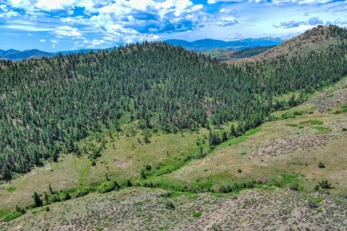 With mostly pines, aspens and rock outcroppings, this property on Fox Acres Country Club in Colorado - for sale on GolfHomes.com, golf home, golf lot