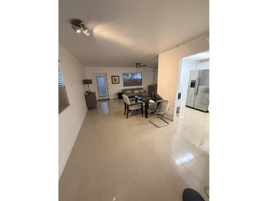 Enjoy tranquil lakeview living in this beautifully updated on Kings Point Golf - Executive in Florida - for sale on GolfHomes.com, golf home, golf lot