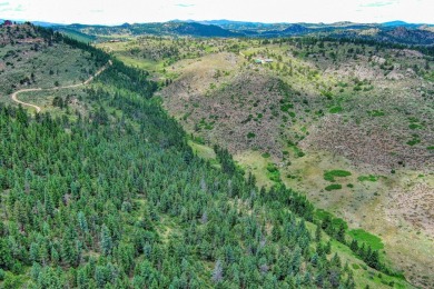 With mostly pines, aspens and rock outcroppings, this property on Fox Acres Country Club in Colorado - for sale on GolfHomes.com, golf home, golf lot