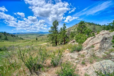 With mostly pines, aspens and rock outcroppings, this property on Fox Acres Country Club in Colorado - for sale on GolfHomes.com, golf home, golf lot