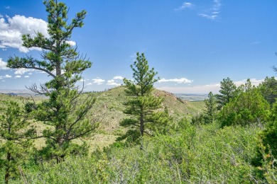 With mostly pines, aspens and rock outcroppings, this property on Fox Acres Country Club in Colorado - for sale on GolfHomes.com, golf home, golf lot