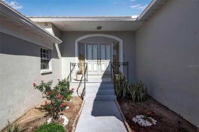 Welcome to Palm Court, a sought-after Mediterranean-style on IMG Academies Golf and Country Club in Florida - for sale on GolfHomes.com, golf home, golf lot