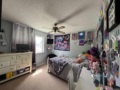 This thoughtfully designed home boasts three generously sized on Riverton Country Club in Wyoming - for sale on GolfHomes.com, golf home, golf lot