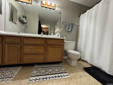 This thoughtfully designed home boasts three generously sized on Riverton Country Club in Wyoming - for sale on GolfHomes.com, golf home, golf lot