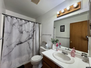 This thoughtfully designed home boasts three generously sized on Riverton Country Club in Wyoming - for sale on GolfHomes.com, golf home, golf lot