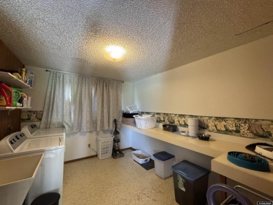This thoughtfully designed home boasts three generously sized on Riverton Country Club in Wyoming - for sale on GolfHomes.com, golf home, golf lot