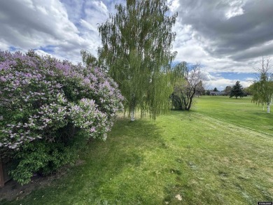 This thoughtfully designed home boasts three generously sized on Riverton Country Club in Wyoming - for sale on GolfHomes.com, golf home, golf lot