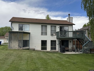 This thoughtfully designed home boasts three generously sized on Riverton Country Club in Wyoming - for sale on GolfHomes.com, golf home, golf lot