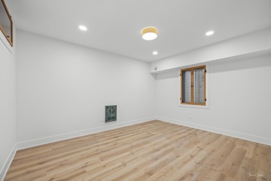 Experience the perfect blend of classic architecture and modern on Lake Barrington Shores Golf Course in Illinois - for sale on GolfHomes.com, golf home, golf lot