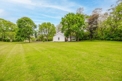 Experience the perfect blend of classic architecture and modern on Lake Barrington Shores Golf Course in Illinois - for sale on GolfHomes.com, golf home, golf lot