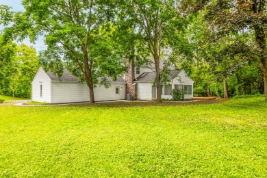 Experience the perfect blend of classic architecture and modern on Lake Barrington Shores Golf Course in Illinois - for sale on GolfHomes.com, golf home, golf lot
