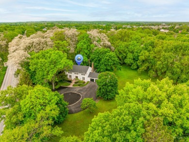Experience the perfect blend of classic architecture and modern on Lake Barrington Shores Golf Course in Illinois - for sale on GolfHomes.com, golf home, golf lot