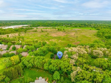 Experience the perfect blend of classic architecture and modern on Lake Barrington Shores Golf Course in Illinois - for sale on GolfHomes.com, golf home, golf lot