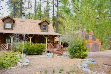 Step into a piece of history with this original log cabin in on Pine Mountain Club in California - for sale on GolfHomes.com, golf home, golf lot