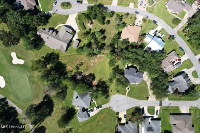 Discover this exquisite 4-bedroom home tucked away in on Diamondhead Country Club in Mississippi - for sale on GolfHomes.com, golf home, golf lot