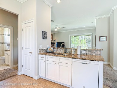 Perfect retirement home located in the desirable Deer Park on Southern Woods Golf Club in Florida - for sale on GolfHomes.com, golf home, golf lot