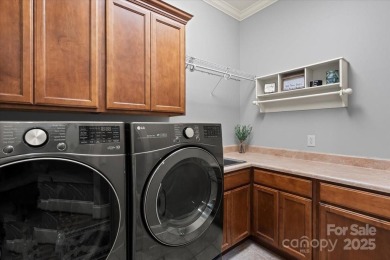 Exceptional home in The Point with fantastic indoor & outdoor on Trump National Golf Club Charlotte in North Carolina - for sale on GolfHomes.com, golf home, golf lot