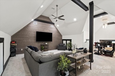 Exceptional home in The Point with fantastic indoor & outdoor on Trump National Golf Club Charlotte in North Carolina - for sale on GolfHomes.com, golf home, golf lot