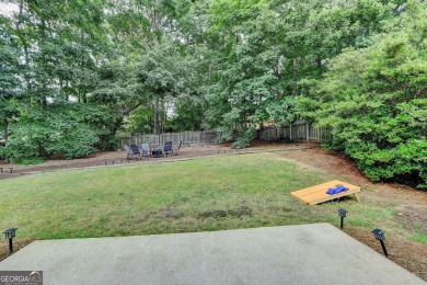 Welcome to a home that blends warmth, comfort, and community in on Hamilton Mill Golf Club in Georgia - for sale on GolfHomes.com, golf home, golf lot