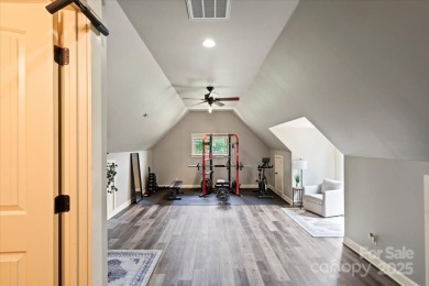 Exceptional home in The Point with fantastic indoor & outdoor on Trump National Golf Club Charlotte in North Carolina - for sale on GolfHomes.com, golf home, golf lot