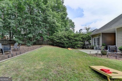Welcome to a home that blends warmth, comfort, and community in on Hamilton Mill Golf Club in Georgia - for sale on GolfHomes.com, golf home, golf lot