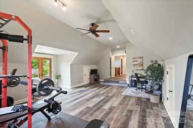 Exceptional home in The Point with fantastic indoor & outdoor on Trump National Golf Club Charlotte in North Carolina - for sale on GolfHomes.com, golf home, golf lot