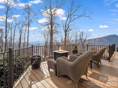 BIG VIEWS from this recently updated three-bedroom, two full on Rumbling Bald Resort on Lake Lure in North Carolina - for sale on GolfHomes.com, golf home, golf lot