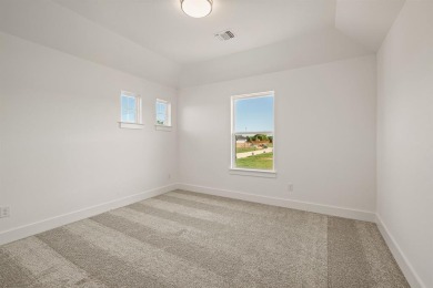 Discover the perfect blend of luxury and lifestyle with Our on The Golf Club at Resort Eagle Mountain Lake in Texas - for sale on GolfHomes.com, golf home, golf lot