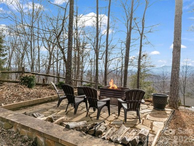 BIG VIEWS from this recently updated three-bedroom, two full on Rumbling Bald Resort on Lake Lure in North Carolina - for sale on GolfHomes.com, golf home, golf lot