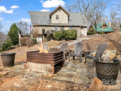 BIG VIEWS from this recently updated three-bedroom, two full on Rumbling Bald Resort on Lake Lure in North Carolina - for sale on GolfHomes.com, golf home, golf lot