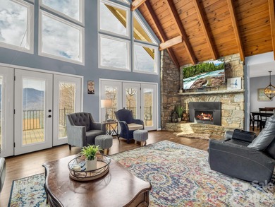 BIG VIEWS from this recently updated three-bedroom, two full on Rumbling Bald Resort on Lake Lure in North Carolina - for sale on GolfHomes.com, golf home, golf lot