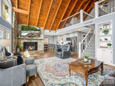 BIG VIEWS from this recently updated three-bedroom, two full on Rumbling Bald Resort on Lake Lure in North Carolina - for sale on GolfHomes.com, golf home, golf lot