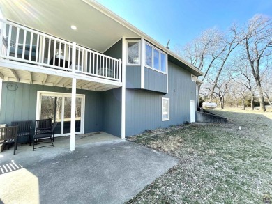 Stunning setting for this 4 BR, 3 BA home on nearly 5 acres on Lake Perry Country Club in Kansas - for sale on GolfHomes.com, golf home, golf lot