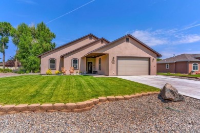 Nestled in the picturesque Cattails Golf Course community in on Cattails Golf Club in Colorado - for sale on GolfHomes.com, golf home, golf lot