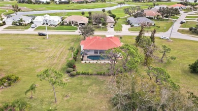Discover the epitome of coastal elegance at 4260 Cape Haze Dr on Rotonda Golf and Country Club The Links Course in Florida - for sale on GolfHomes.com, golf home, golf lot