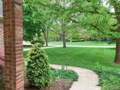 This stately, custom built home rests one of the most beautiful on Stonebridge Golf Club in Michigan - for sale on GolfHomes.com, golf home, golf lot
