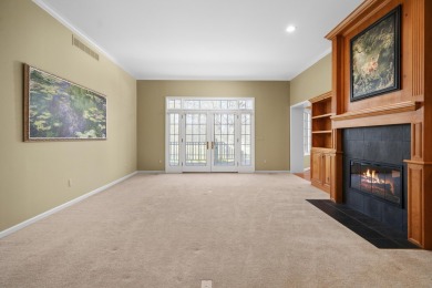 This stately, custom built home rests one of the most beautiful on Stonebridge Golf Club in Michigan - for sale on GolfHomes.com, golf home, golf lot