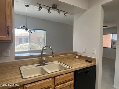 Just enough space to be comfortable in your second home.  Light on Canoa Hills Golf Course in Arizona - for sale on GolfHomes.com, golf home, golf lot